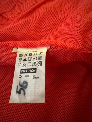 Cortavientos Quechua rosa anaranjado 8-9A