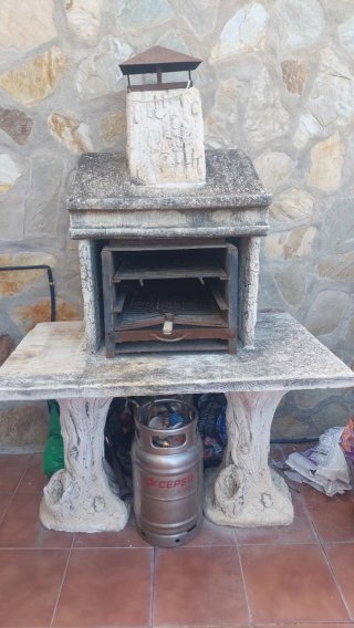 Barbacoa de obra con chimenea