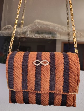 Bolso de mano rayas naranja y negro