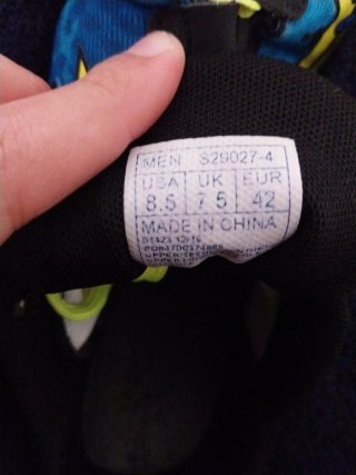 Zapatillas de clavos Saucony azules y verdes