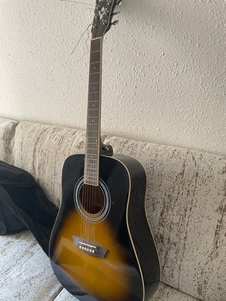 Guitarra Acústica Negra y Sunburst