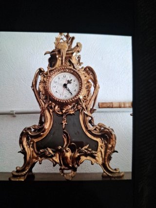 Reloj antiguo de bronce