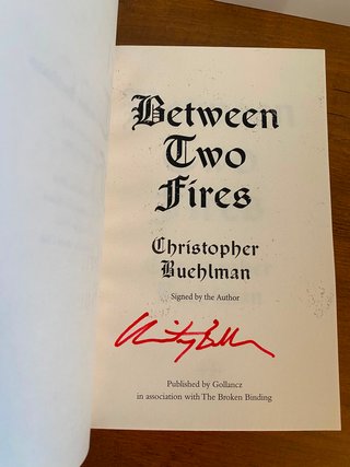 Between Two Fires - Firmado - Broken Binding