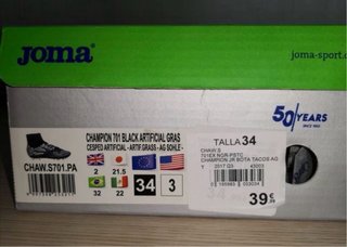 Botas de fútbol Joma,negras y blancas