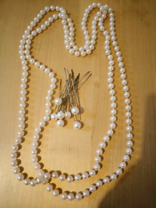Collezione di gioielli vintage: collane, bracciali e portacipria