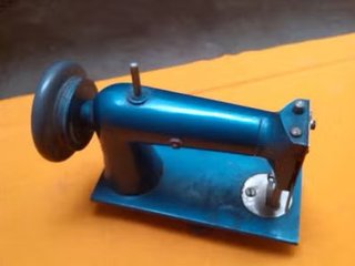 Máquina de coser juguete Eureka metal