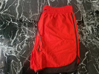 Pantalón corto deportivo hombre rojo
