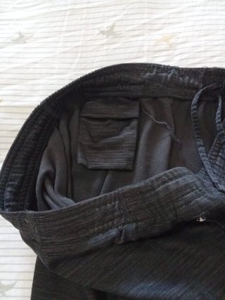 Pantalón deportivo Decathlon negro y verde