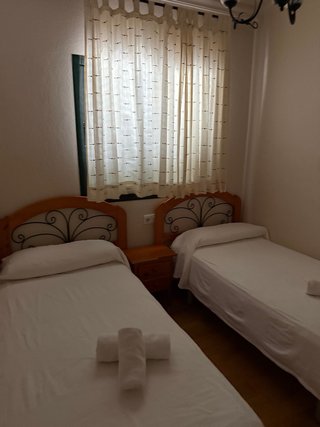 Cabeceros de cama de madera y metal