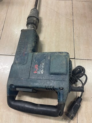 Martillo perforador eléctrico antiguo