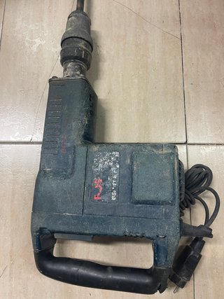 Martillo perforador eléctrico antiguo