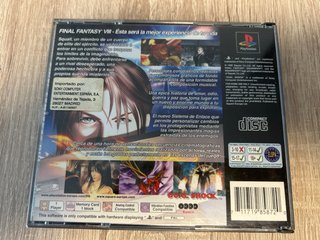 Console PS1 grigia con 3 giochi