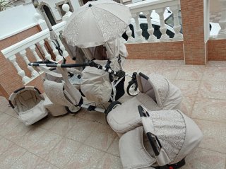Carro gemelar con accesorios