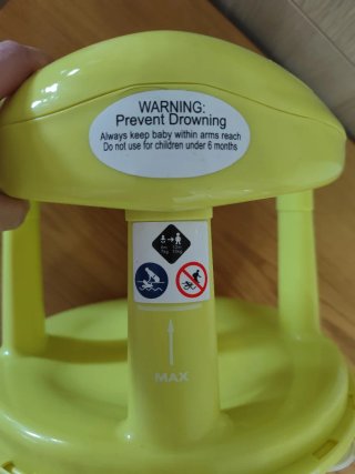 Asiento bañera bebé amarillo con bola giratoria