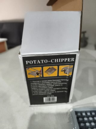Picadora de patatas plateada