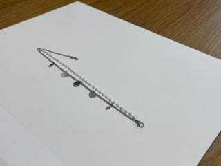 Pulsera plateada con dijes acero inoxidable