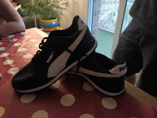Zapatillas Puma Negras y Blancas