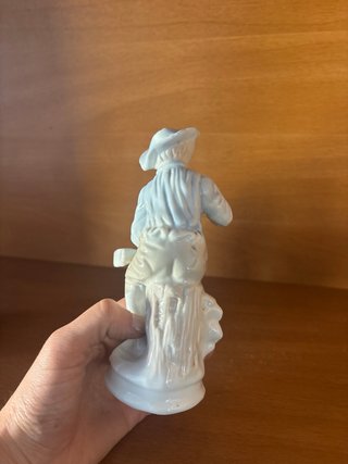 Figura de porcelana flautista