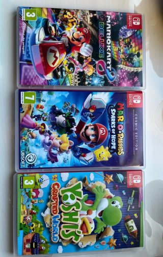 Nintendo Switch Lite + 3 Juegos + funda + cargador