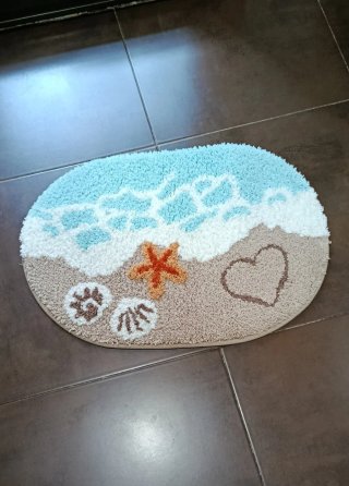 Tappetino da bagno con design da spiaggia