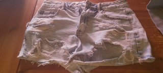 Shorts jeans strappati donna
