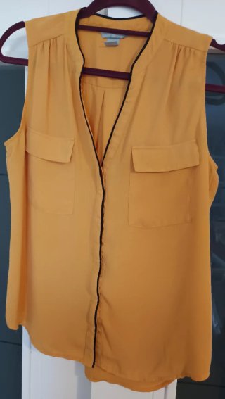 Camisa sin mangas amarilla