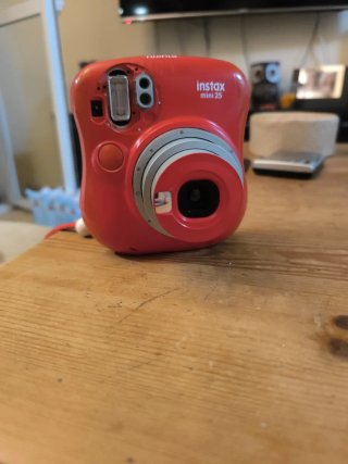 Fujifilm Instax Mini 25 Cámara Roja con defectos