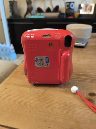 Fujifilm Instax Mini 25 Cámara Roja con defectos
