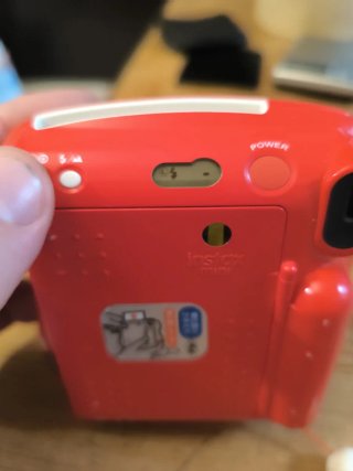 Fujifilm Instax Mini 25 Cámara Roja con defectos