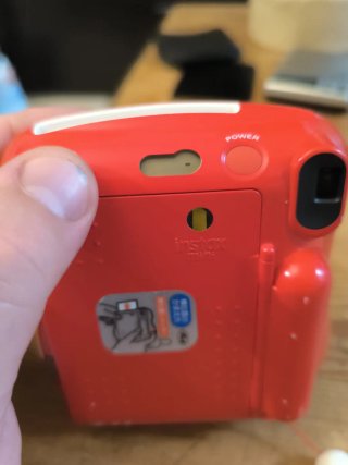 Fujifilm Instax Mini 25 Cámara Roja con defectos