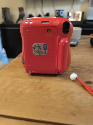 Fujifilm Instax Mini 25 Cámara Roja con defectos
