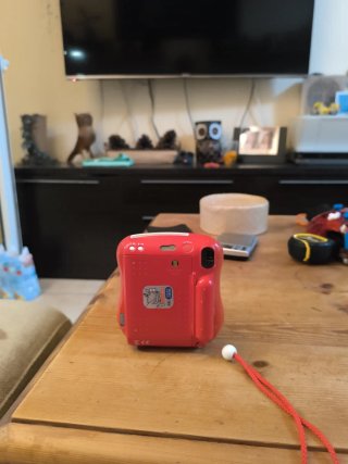 Fujifilm Instax Mini 25 Cámara Roja con defectos