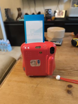 Fujifilm Instax Mini 25 Cámara Roja con defectos
