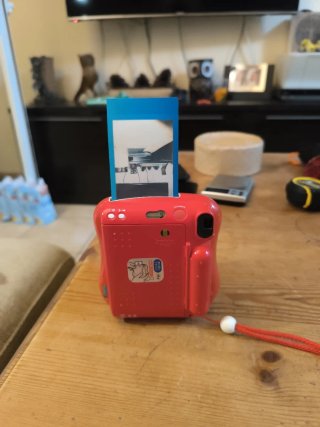 Fujifilm Instax Mini 25 Cámara Roja con defectos