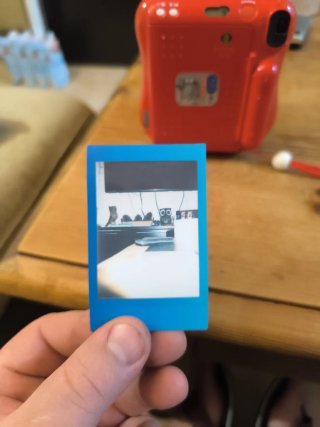 Fujifilm Instax Mini 25 Cámara Roja con defectos