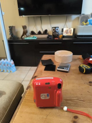 Fujifilm Instax Mini 25 Cámara Roja con defectos