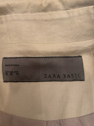 Gabardina chica color beige marca Zara talla M