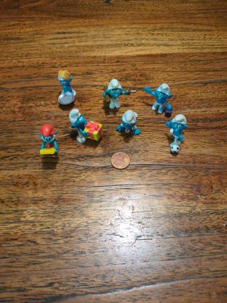 Lote de 7 figuras pequeñas de Pitufos