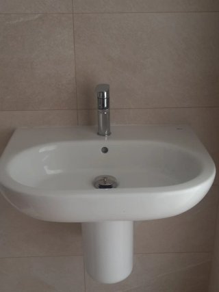 Lavabo de porcelana blanco