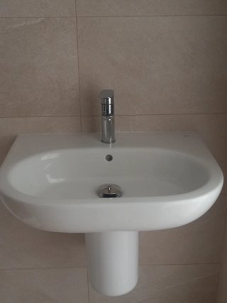 Lavabo de porcelana blanco