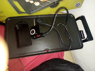 Plancha Eléctrica Taurus Enya en su caja original