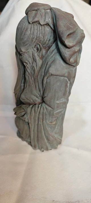 Escultura monje oriental