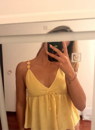 Top cintilante amarelo S