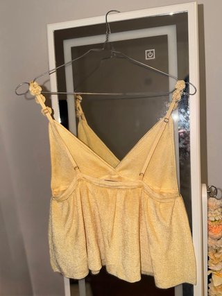 Top cintilante amarelo S