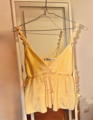 Top cintilante amarelo S