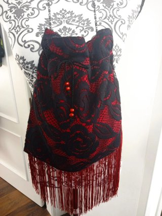 Bolso de encaje con flecos