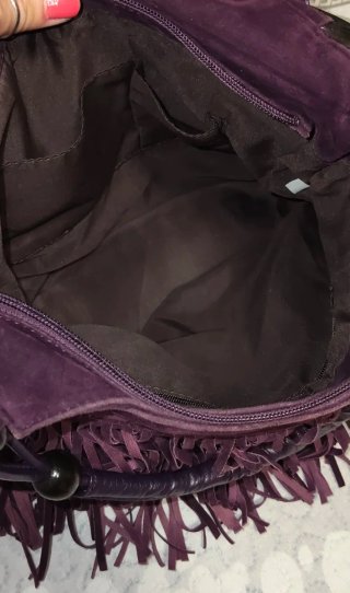 Bolso morado con flecos
