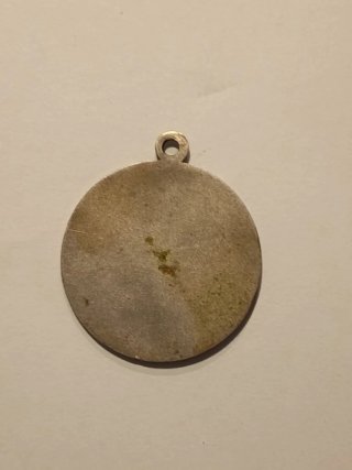 Medalla religiosa antigua de plata