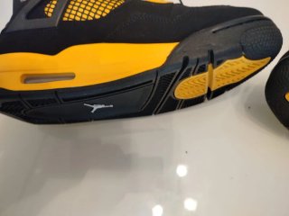 Zapatillas Jordan 4 Niño Negro Amarillo