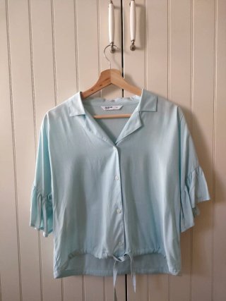 Camisa azul claro manga corta